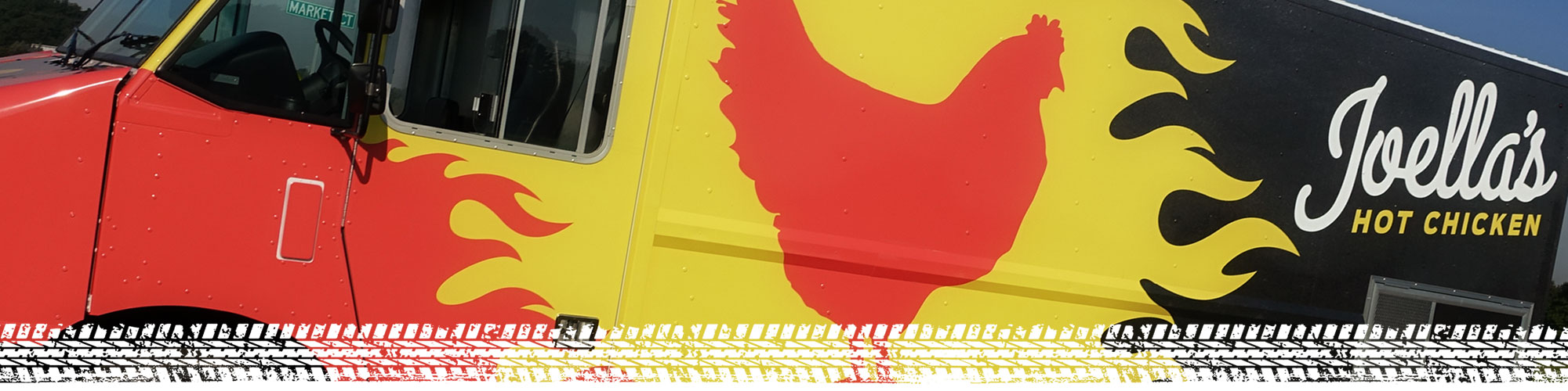 Joella's Food Truck hero image with tire tread border