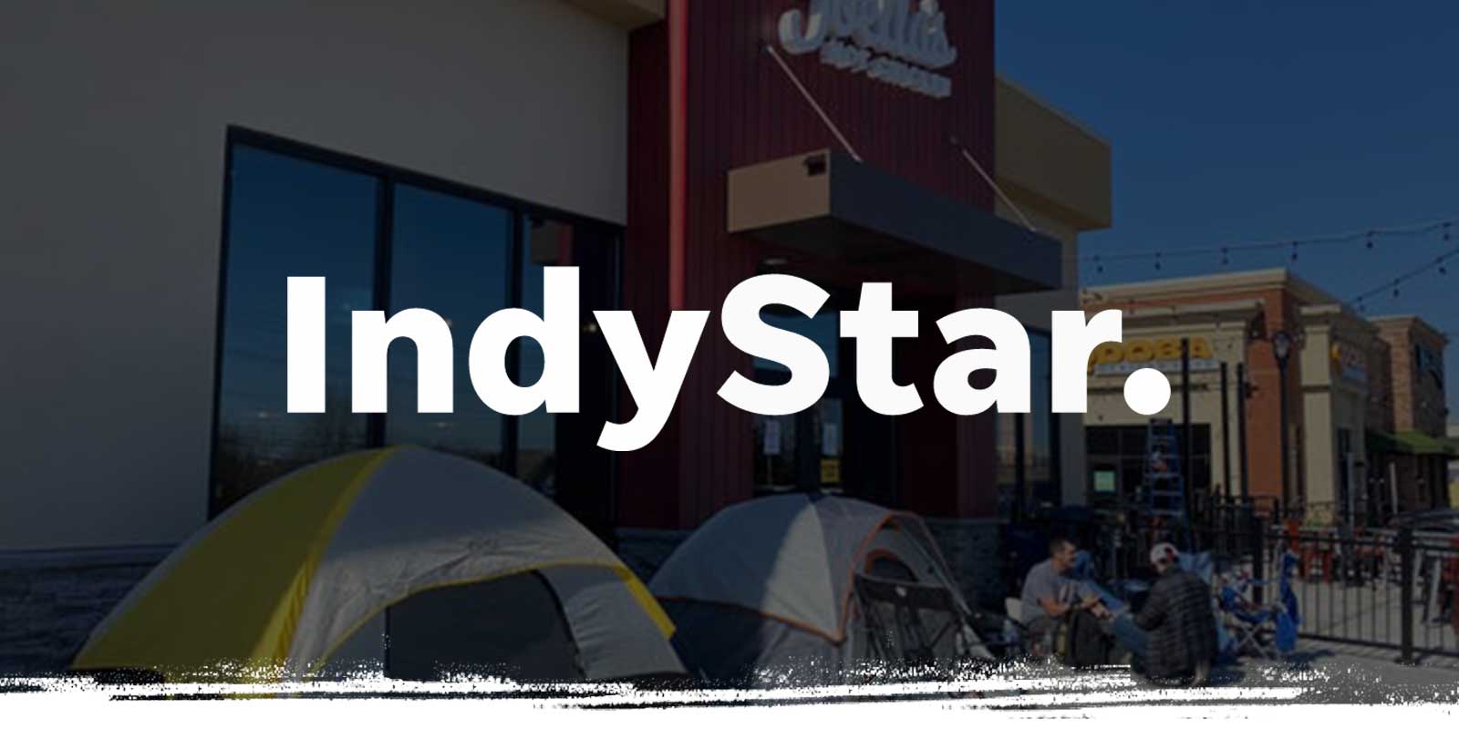 Indy Star logo on people camping out in front of store background